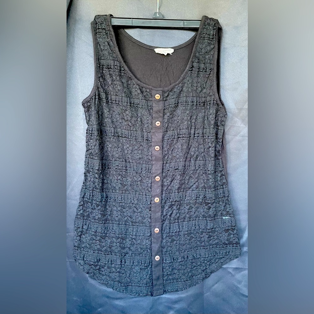 Black tank. Size Large. Back is solid black, front is see through pattern.